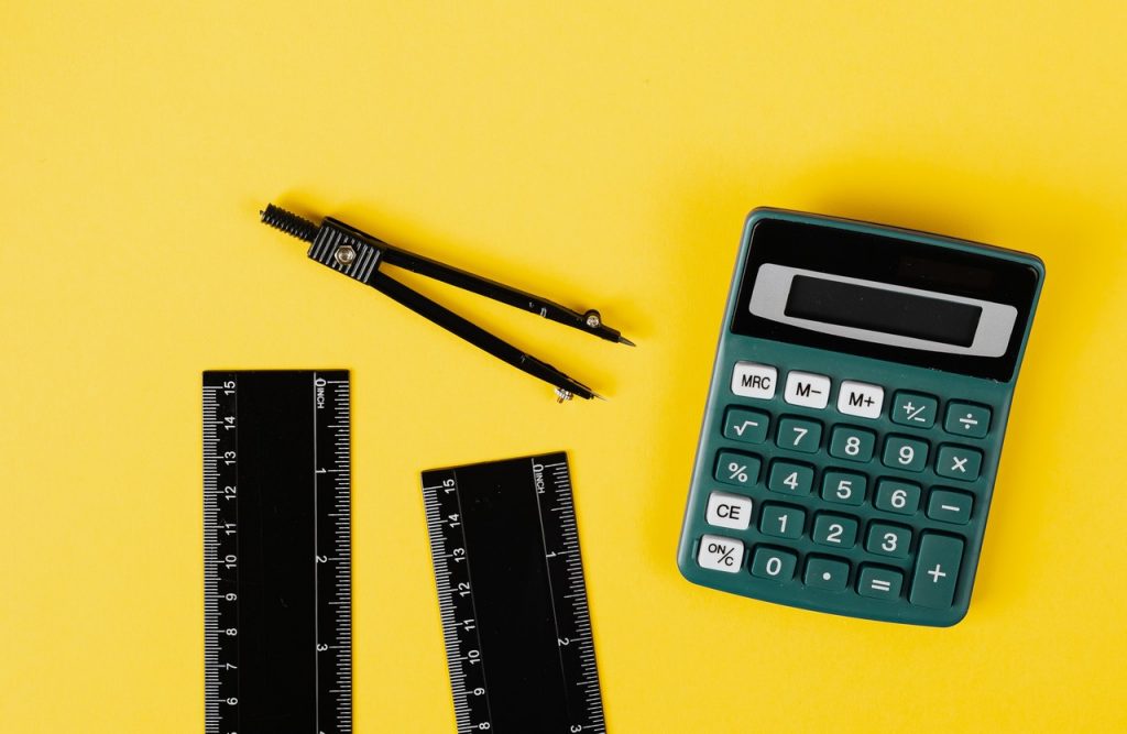 Python Development Tools Picture of a ruler calipers and a pocket calculator