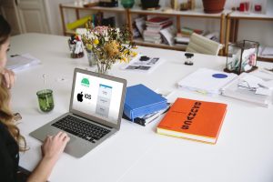 A woman using the best low code mobile app development platform