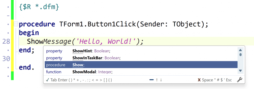 Delphi code editor showing Button1Click with ShowMessageHello World and an autocomplete dropdown